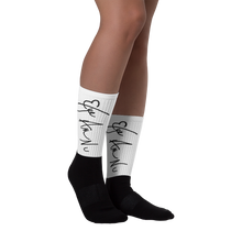 "Eye Am Nu" (TM) Signature Black foot socks